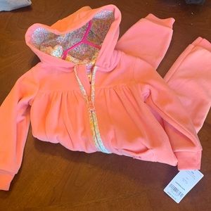 NWT pink fleece body suit